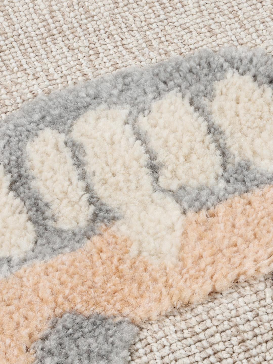 Tapis rond avec des motifs de transport et de météo en terracotta et rouge