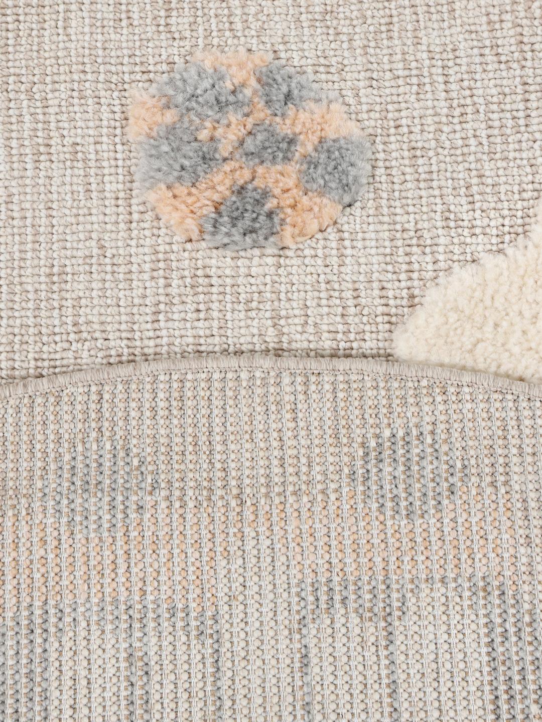 Tapis rond avec des motifs de transport et de météo en terracotta et rouge
