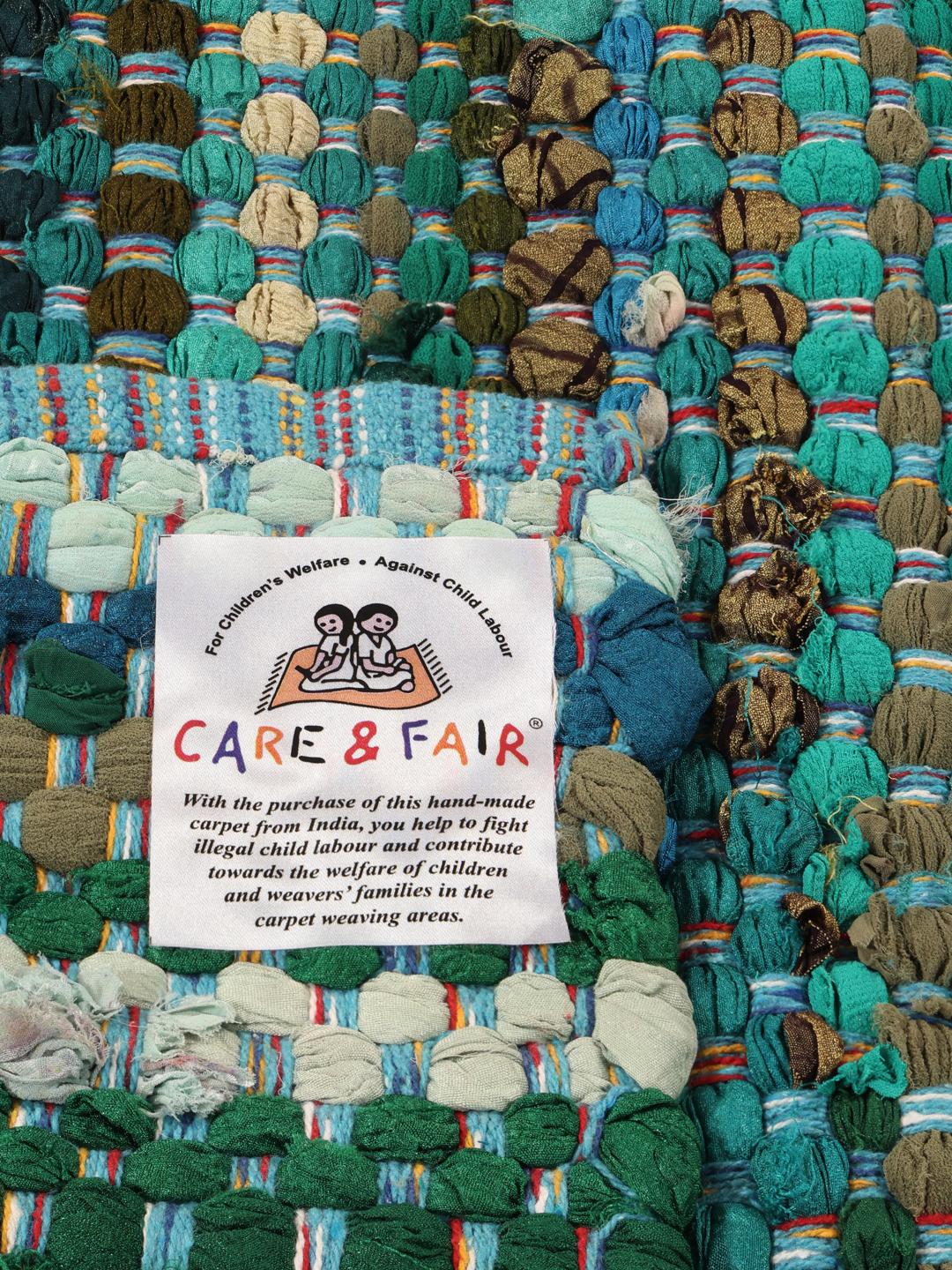 Tapis en 100% coton tissé à la main dans des tons multicolores turquoise et bleu sarcelle