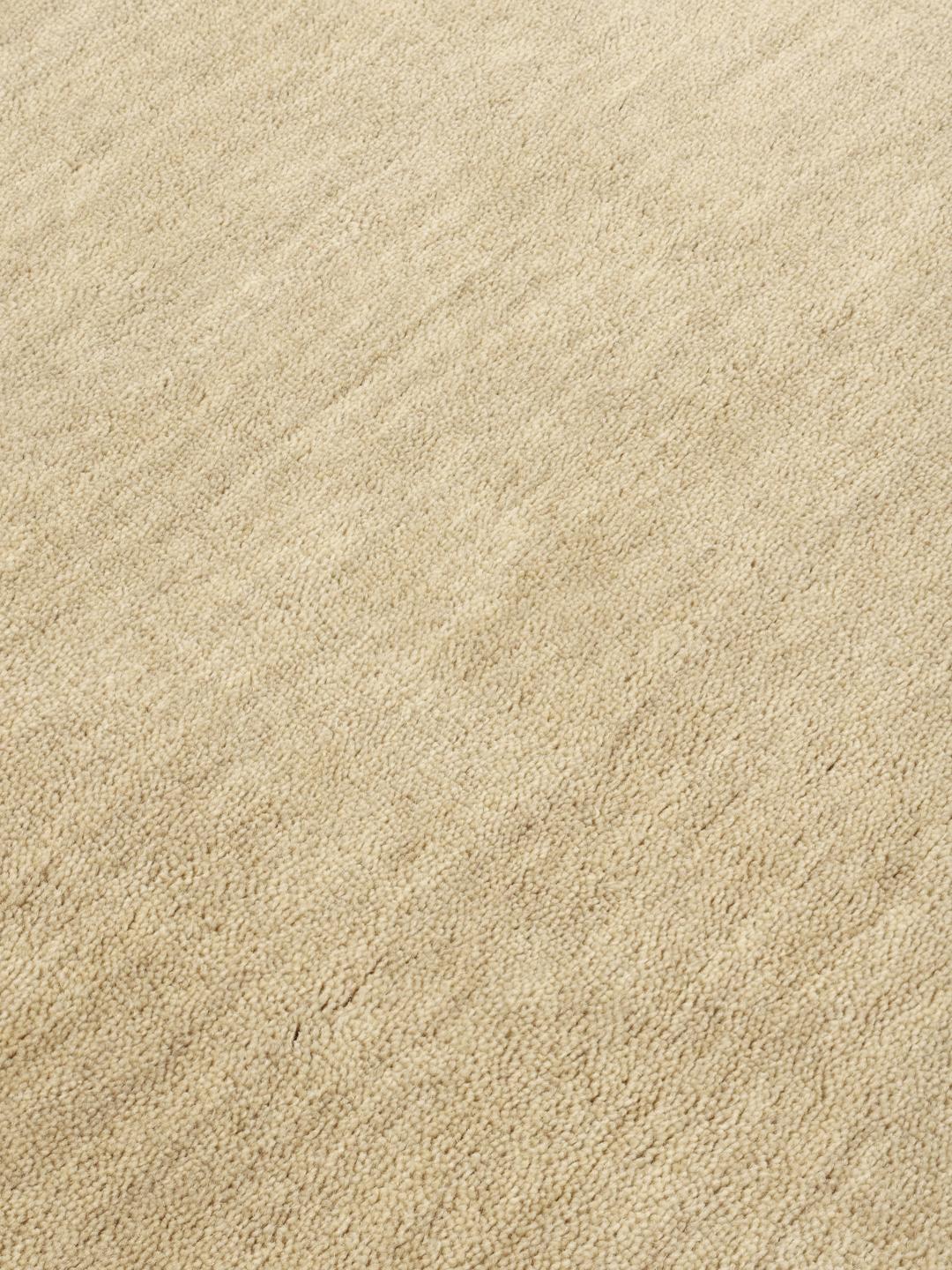 Tapis rond à poils ras beige