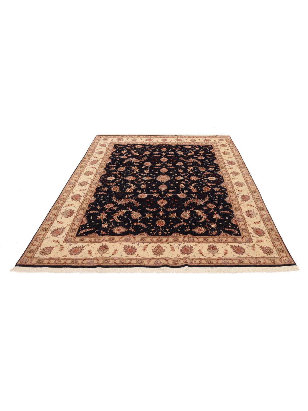 Hand-knotted Tabriz rug with a black field and floral patterns from the Middle East