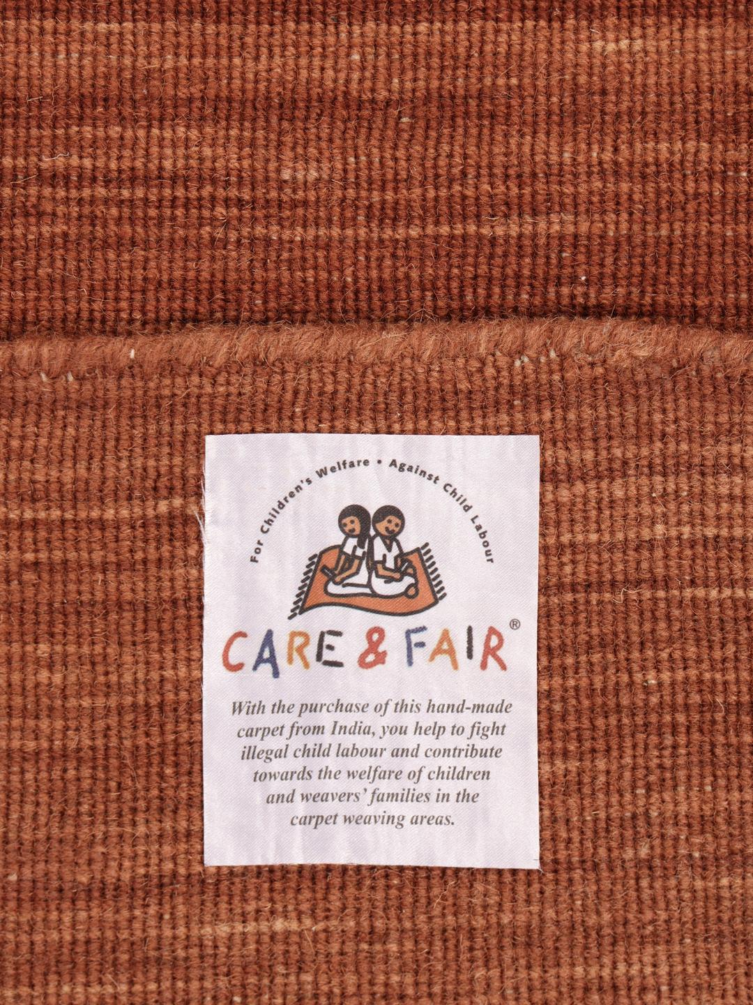Tapis rond tissé à la main rouge rouille