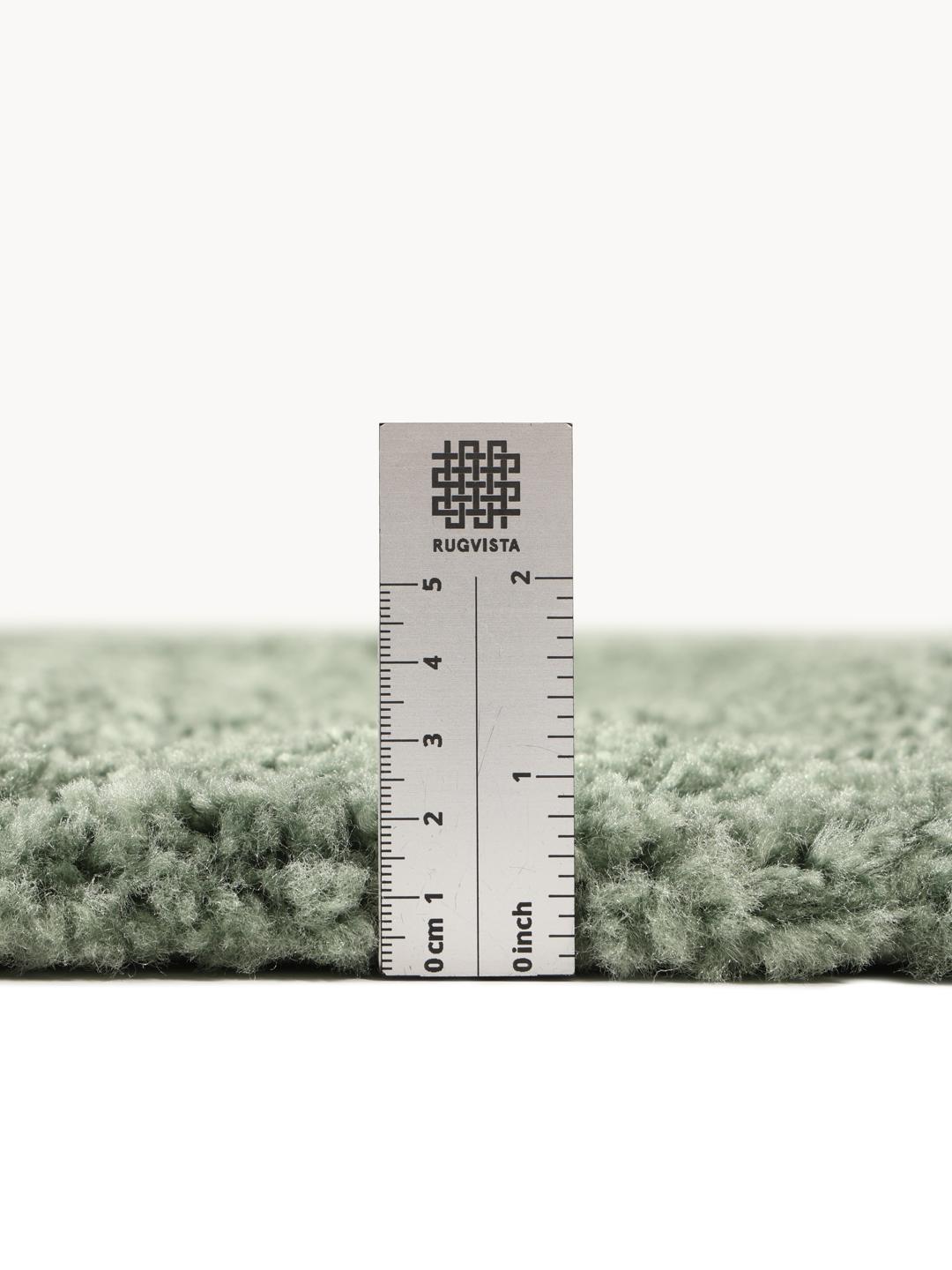 Groen tapijt met een zacht poaloppervlak