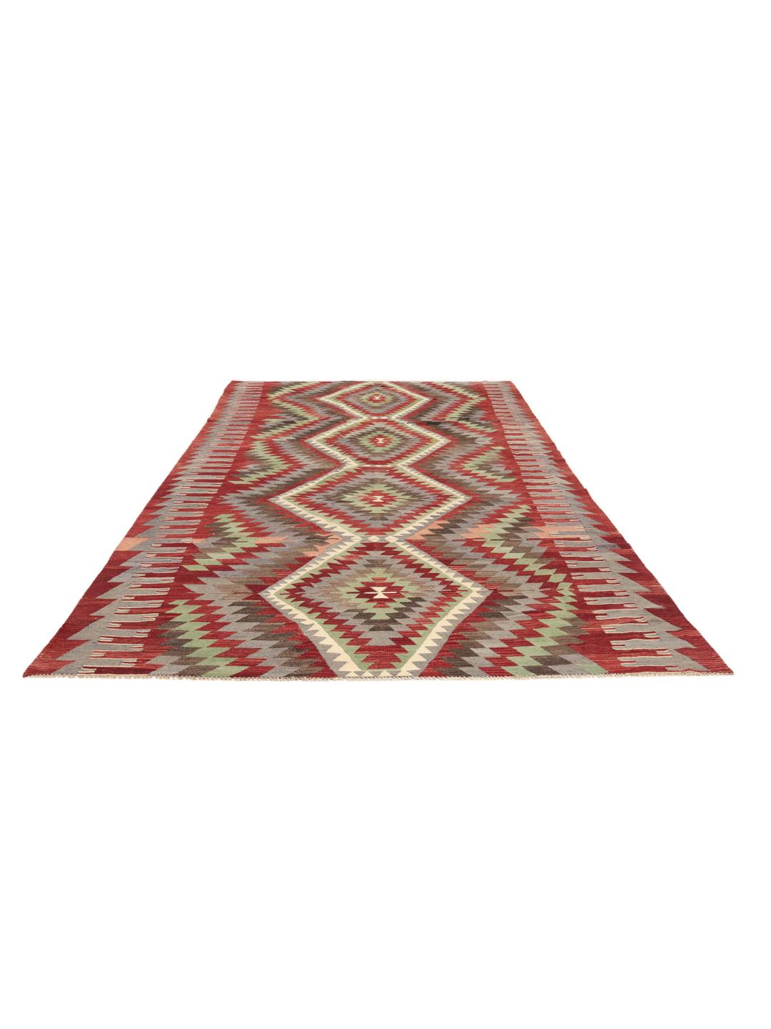 Handgeweven Turks kelimkleed met levendige geometrische patronen in rood, groen en grijs