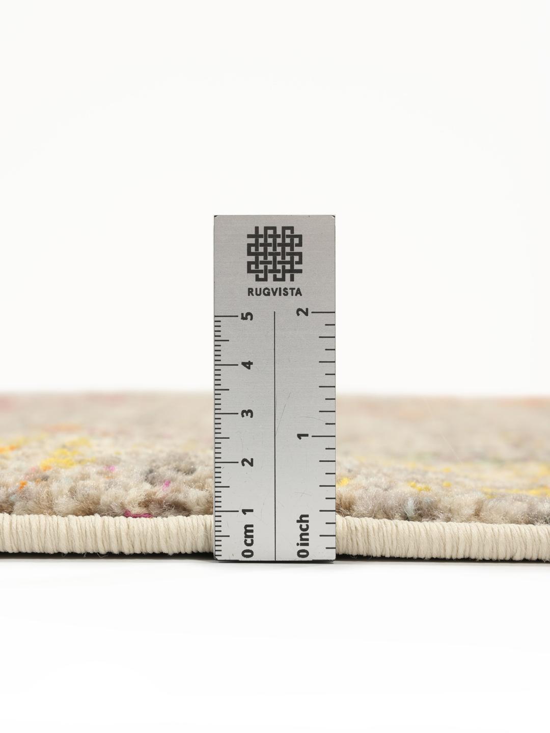 Rond meerkleurig vloerkleed met een abstract design