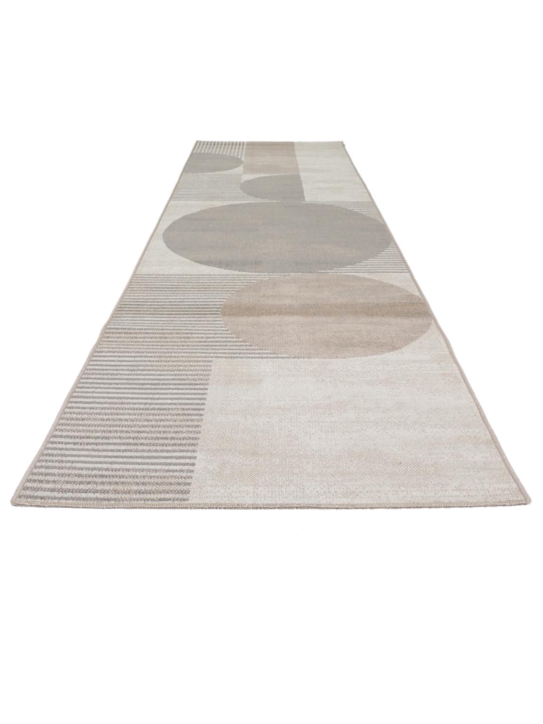 Beige og grå løber med geometriske cirkulære mønstre