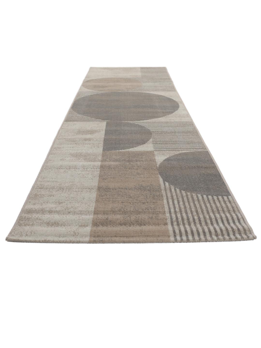 Beige og grå løber med geometriske cirkulære mønstre