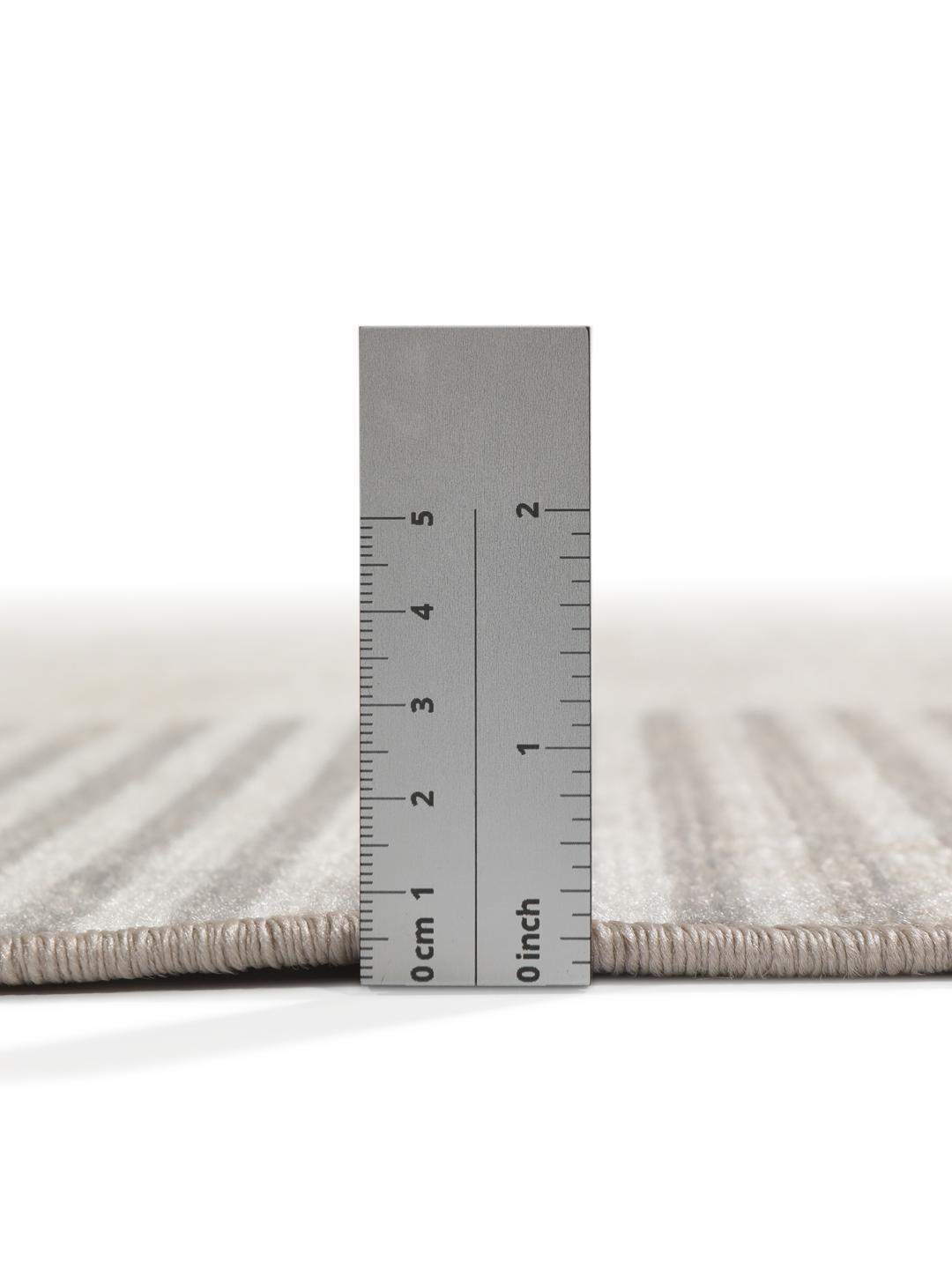 Beige og grå løber med geometriske cirkulære mønstre
