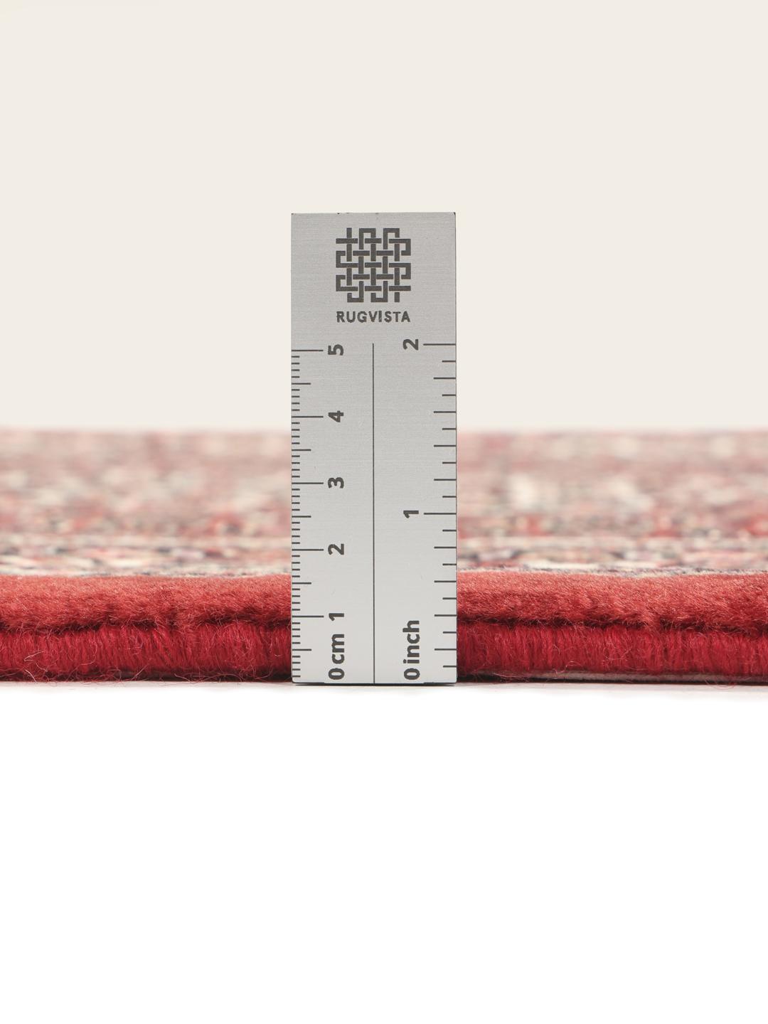 Handgeknoopte Bidjar loper in rood met florale zijden accenten