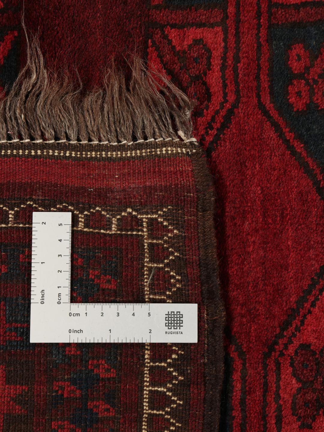 Tapis Afghan Khal Mohammadi noué à la main en rouge profond avec des médaillons géométriques