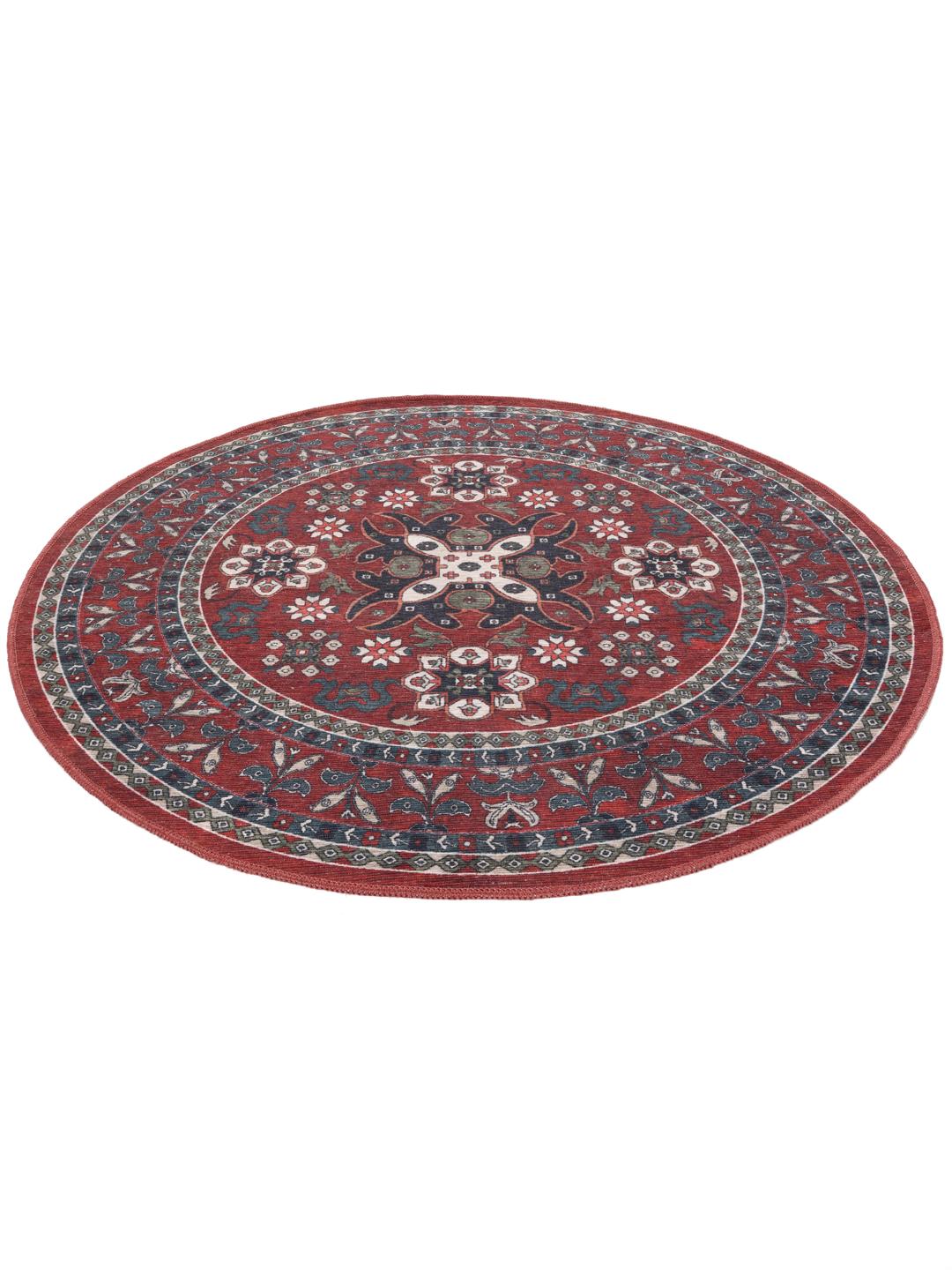 Rond rood tapijt met traditioneel patroon