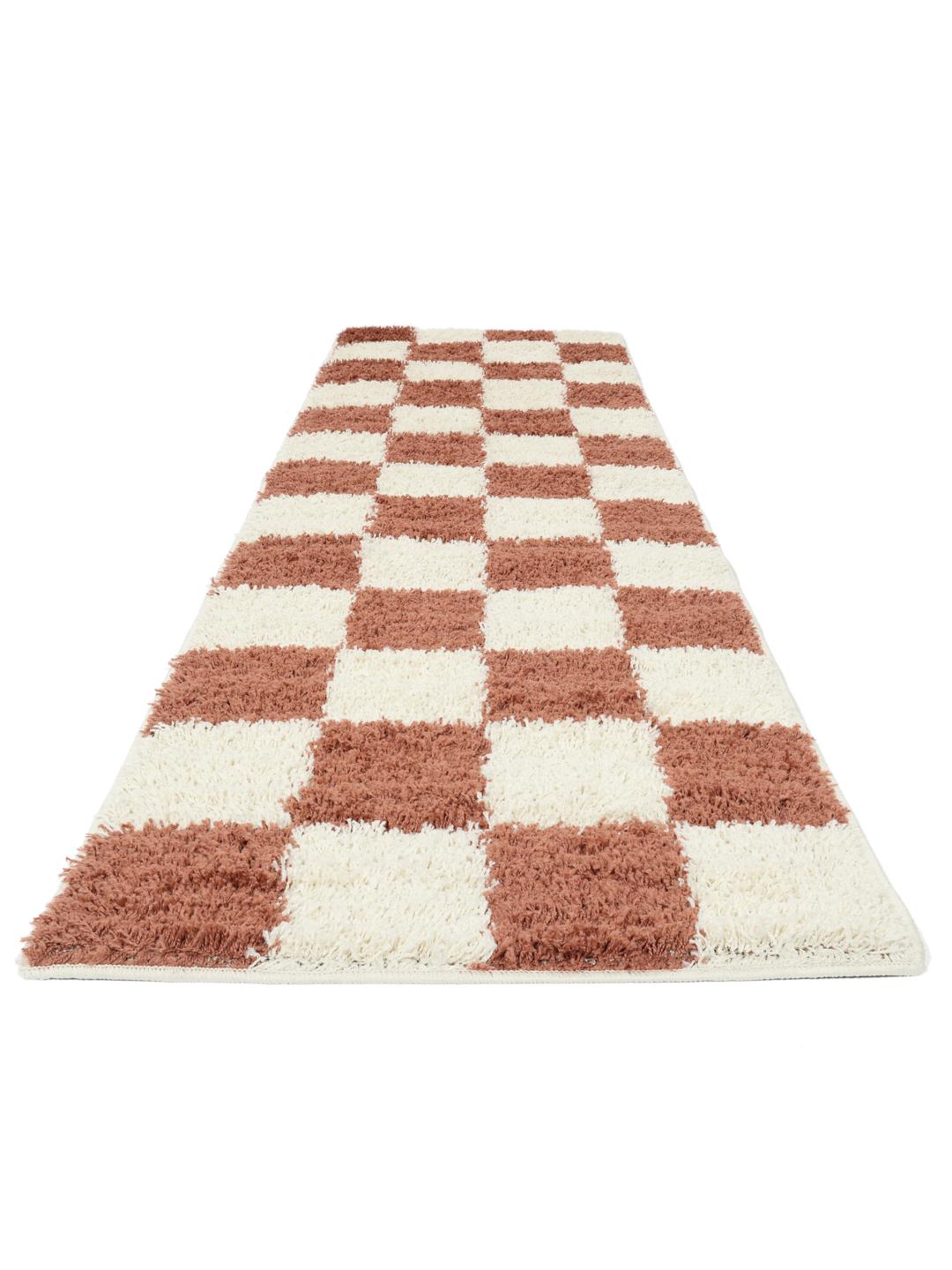 Loper in roestrood en off-white met een dikke pool