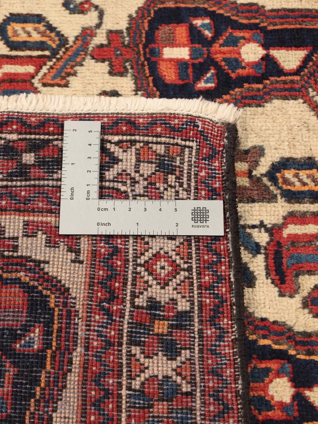 Hand-knotted Afshar rug from the Middle East in beige with floral motifs