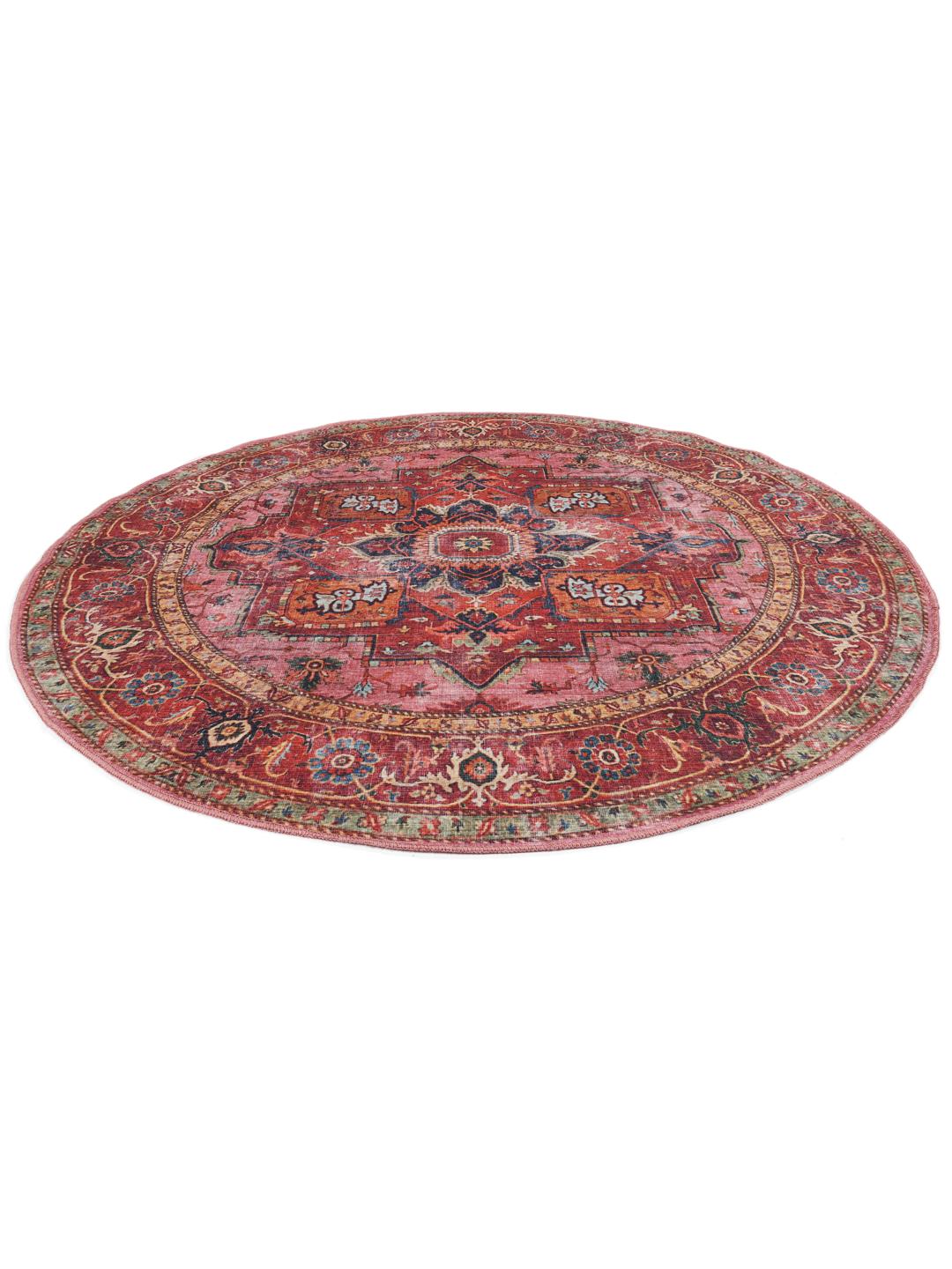 Rond tapijt in rood en roze