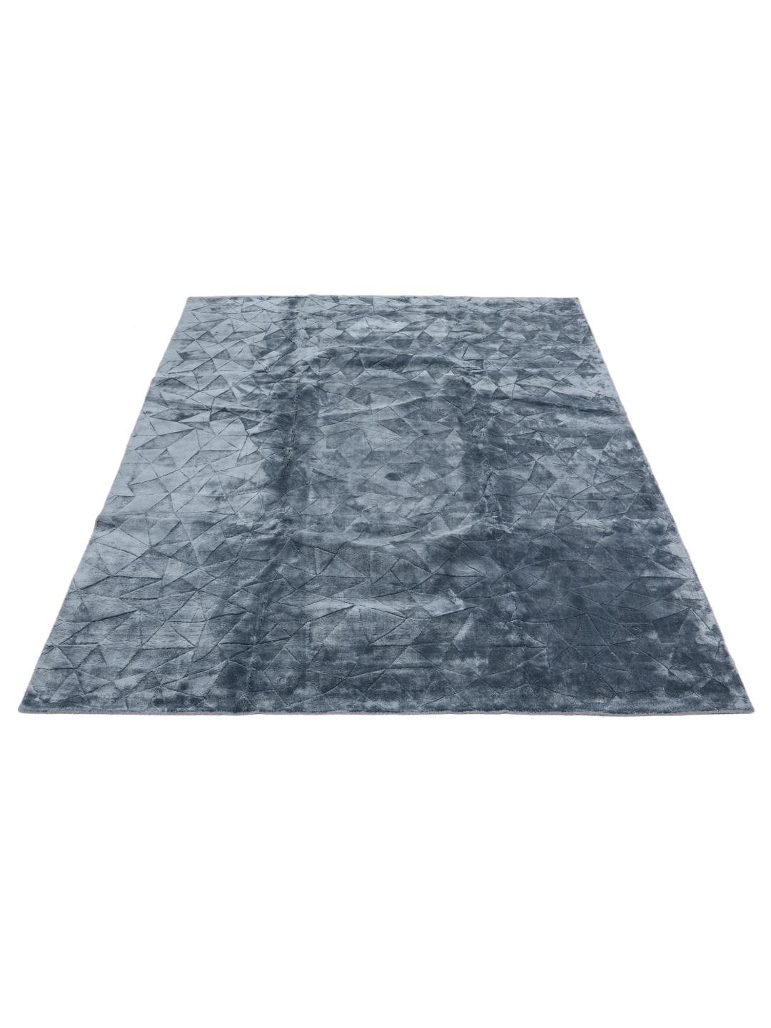 Modern blauw vloerkleed met geometrisch patroon