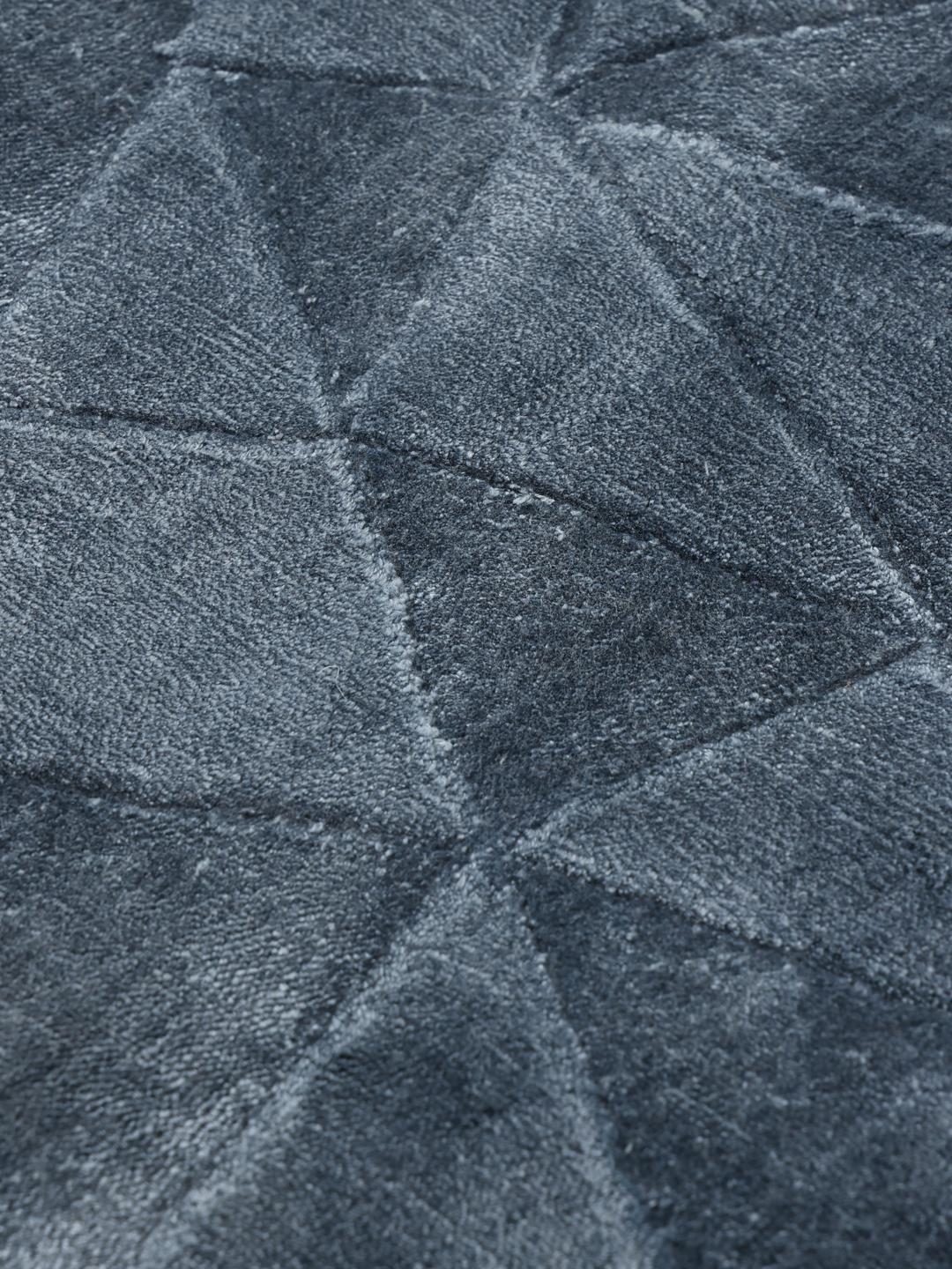 Modern blauw vloerkleed met geometrisch patroon