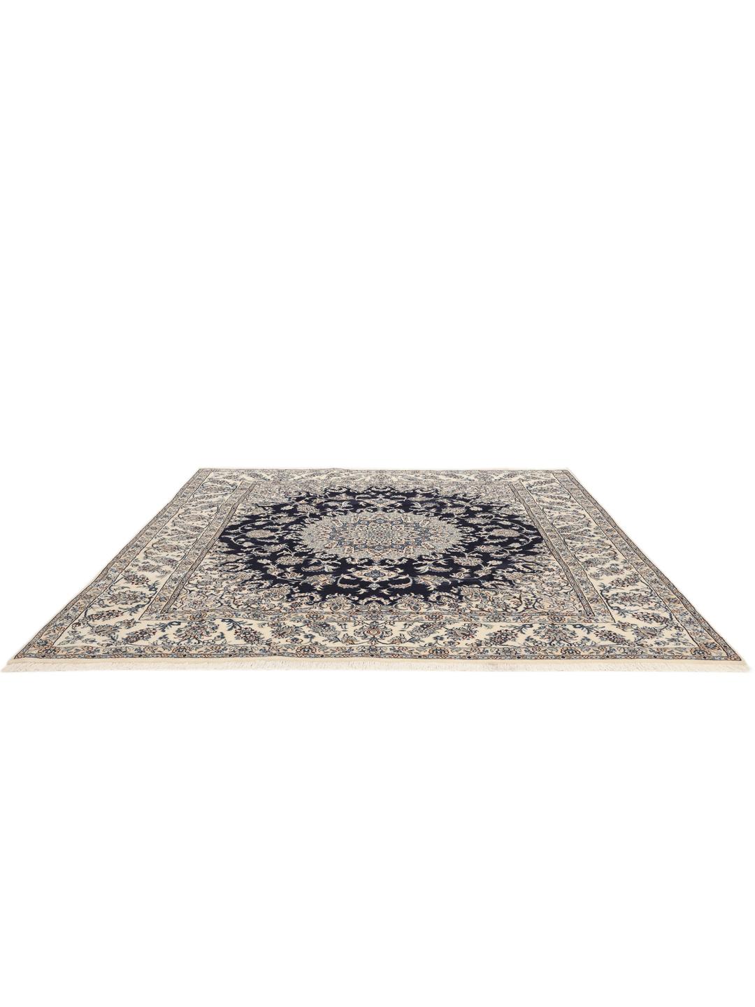 Hand-knotted Nain rug from the Middle East with a dark-blue and cream floral design