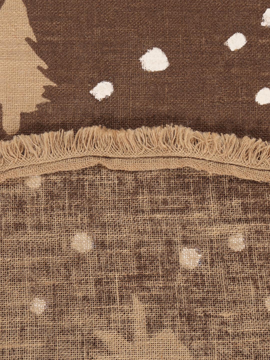 Round brown rug with pine tree and dot pattern