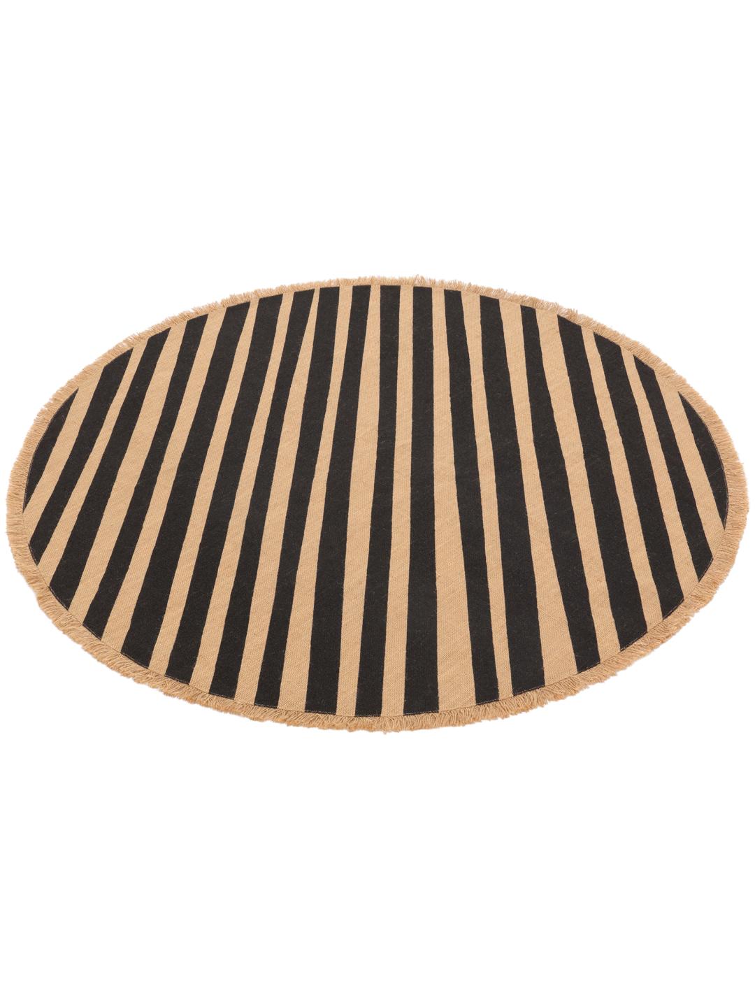 round beige and black rug with fringe and stripes