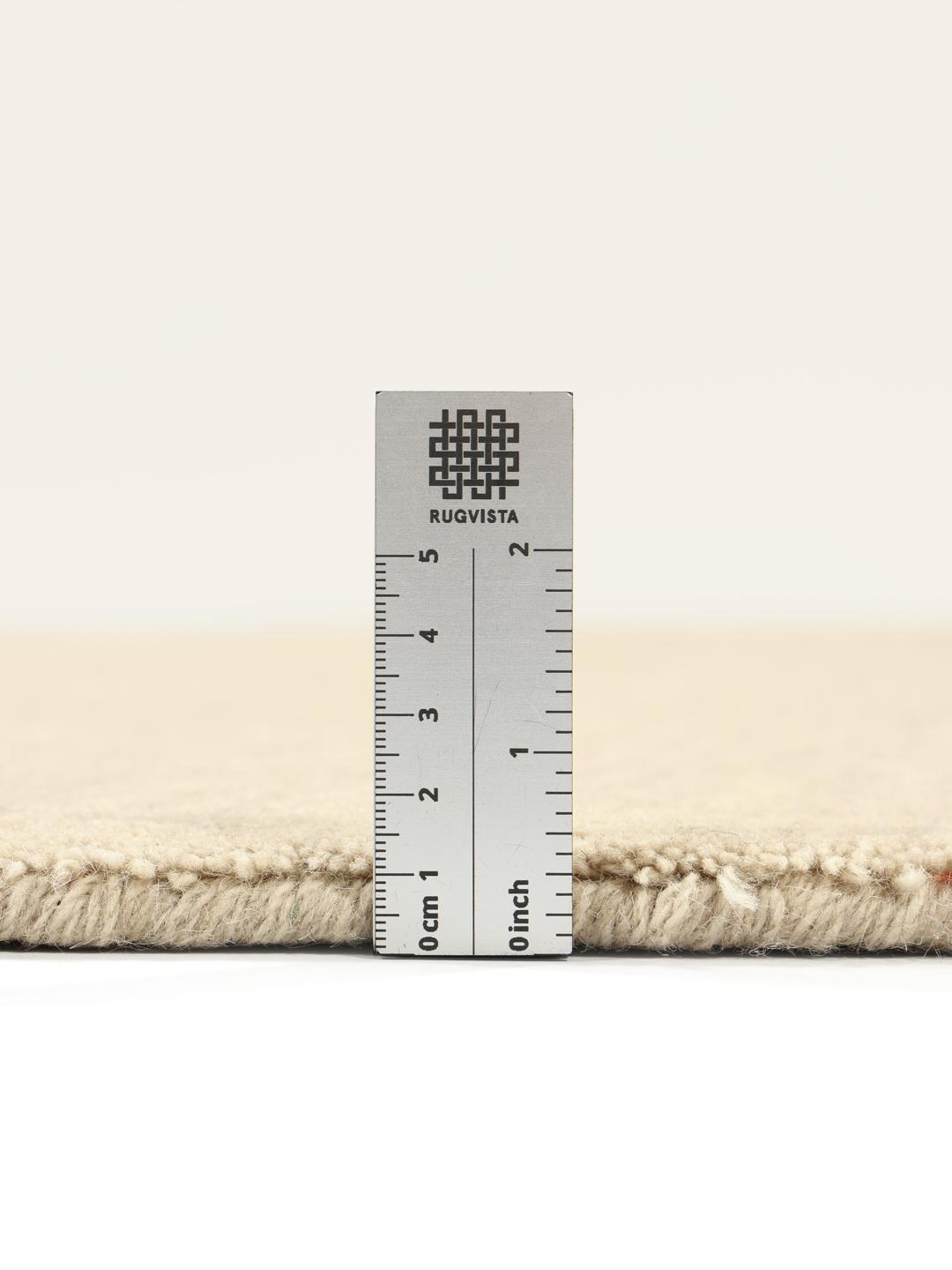 Beige round pile rug