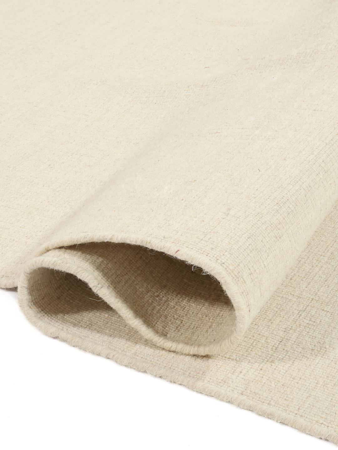 Tapete quadrado branco tecido à mão