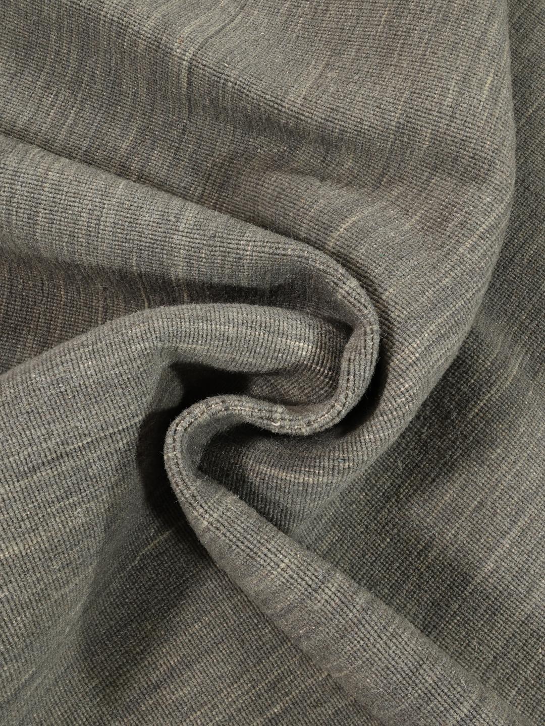 Hand-woven square rug in dark grey