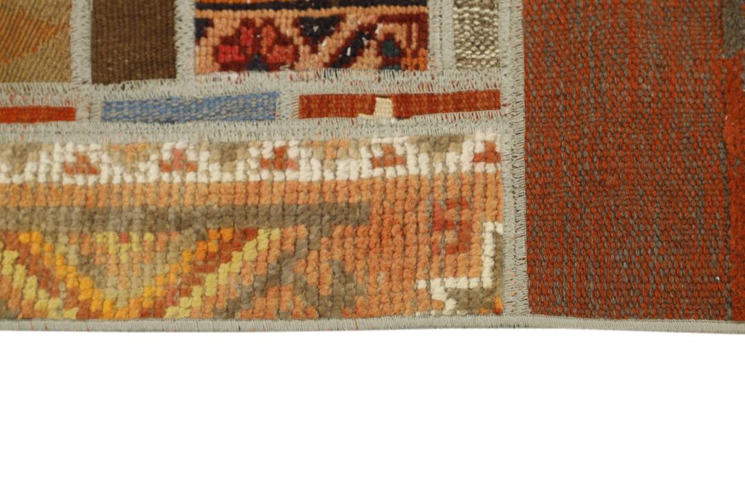 Handgemaakt multicolour wollen vloerkleed met patchwork patroon uit het Midden-Oosten