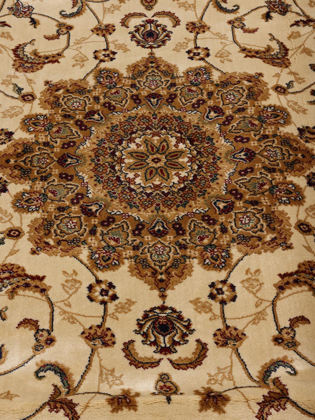 Beige floral medallion rug with intricate Middle Eastern inspired patterns