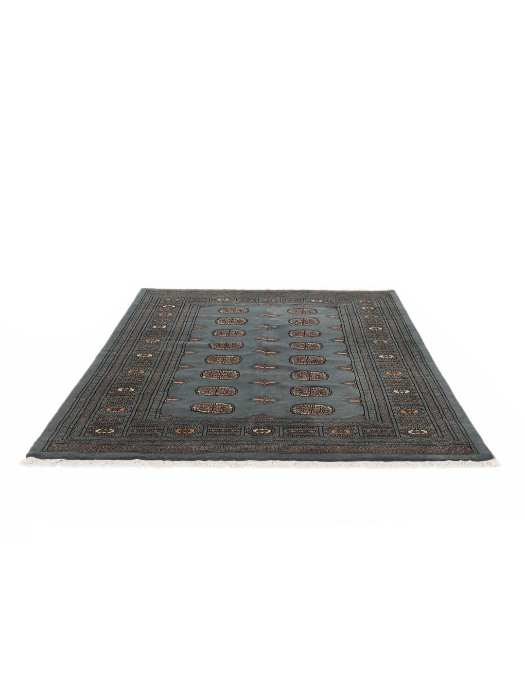 Hand-knotted Pakistan Bokhara rug in a serene blue with traditional motifs