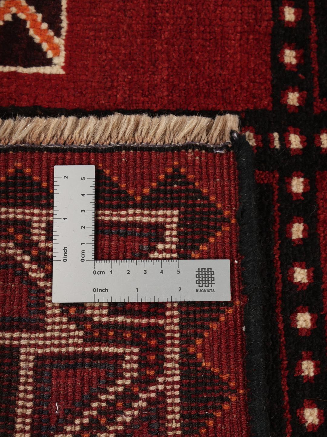 Håndknyttet Lori-tæppe fra Mellemøsten i mørkerøde nuancer med geometriske motiver