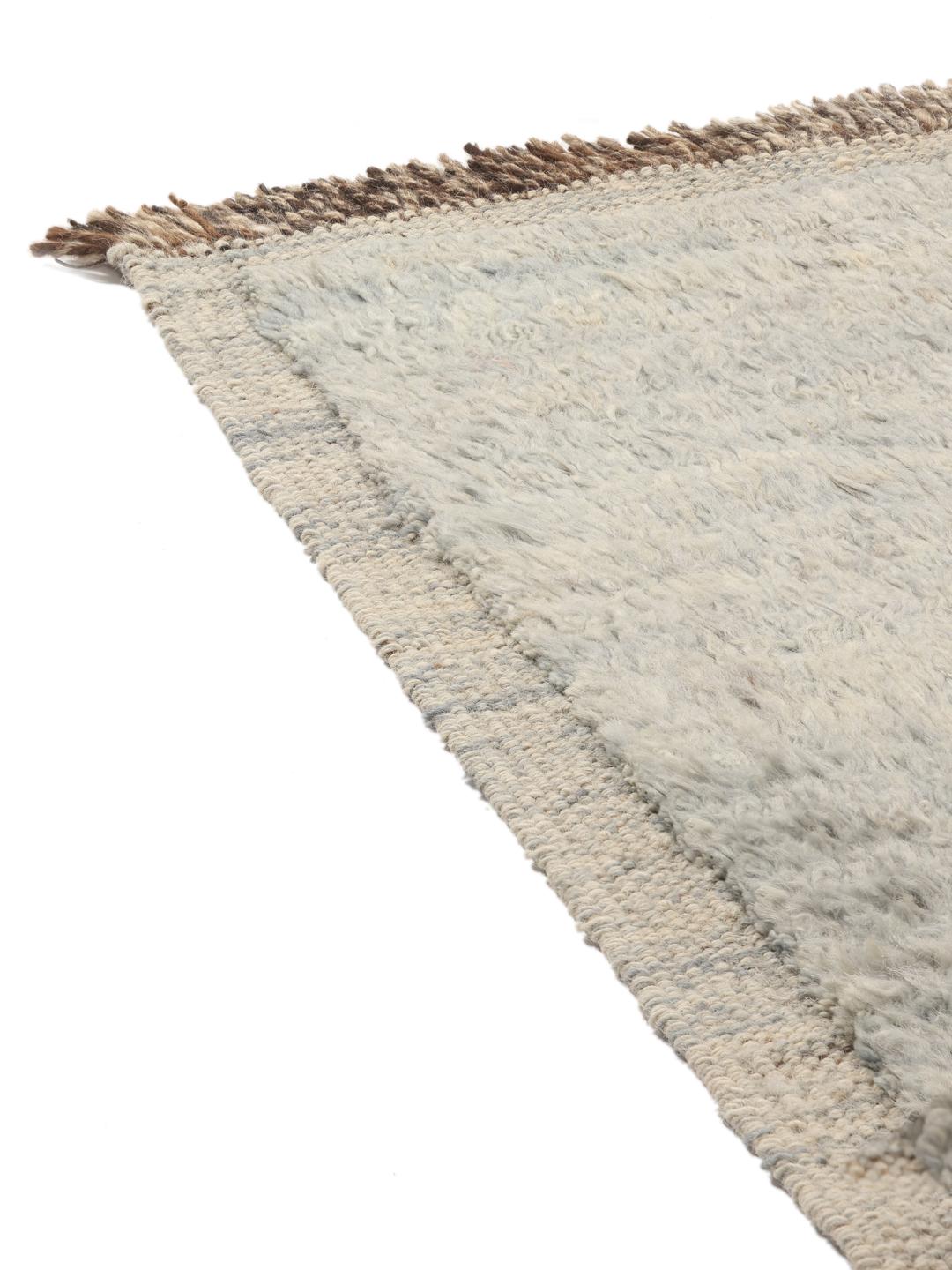 Håndknyttet afghansk tæppe i en neutral beige tone