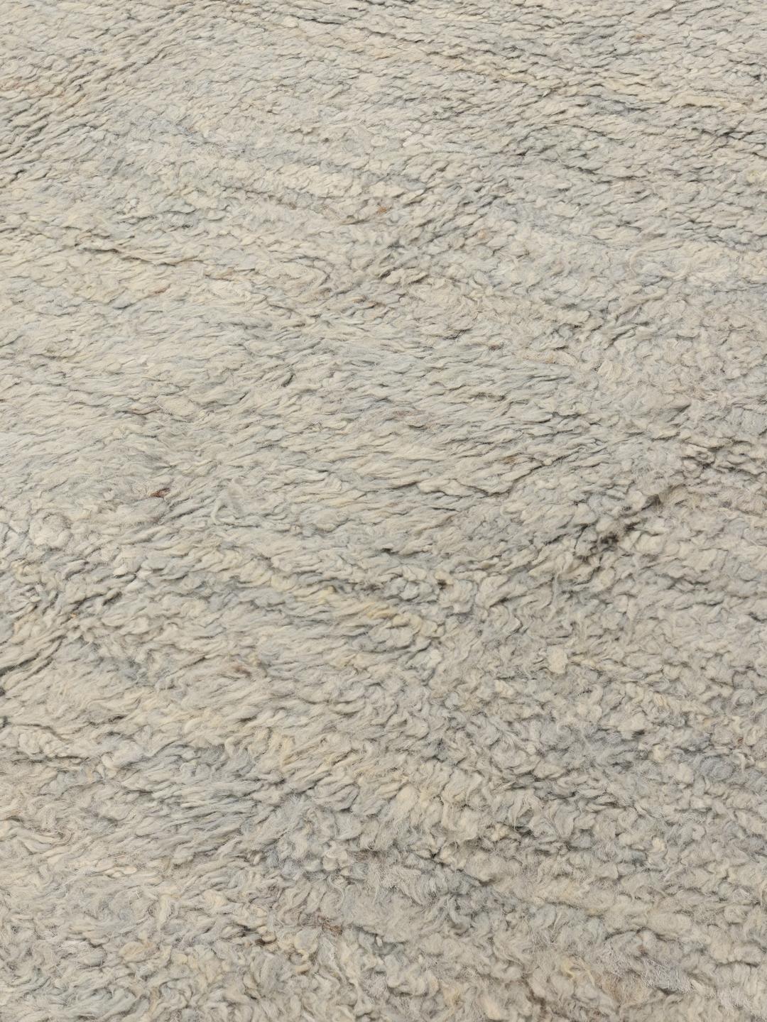 Håndknyttet afghansk tæppe i en neutral beige tone
