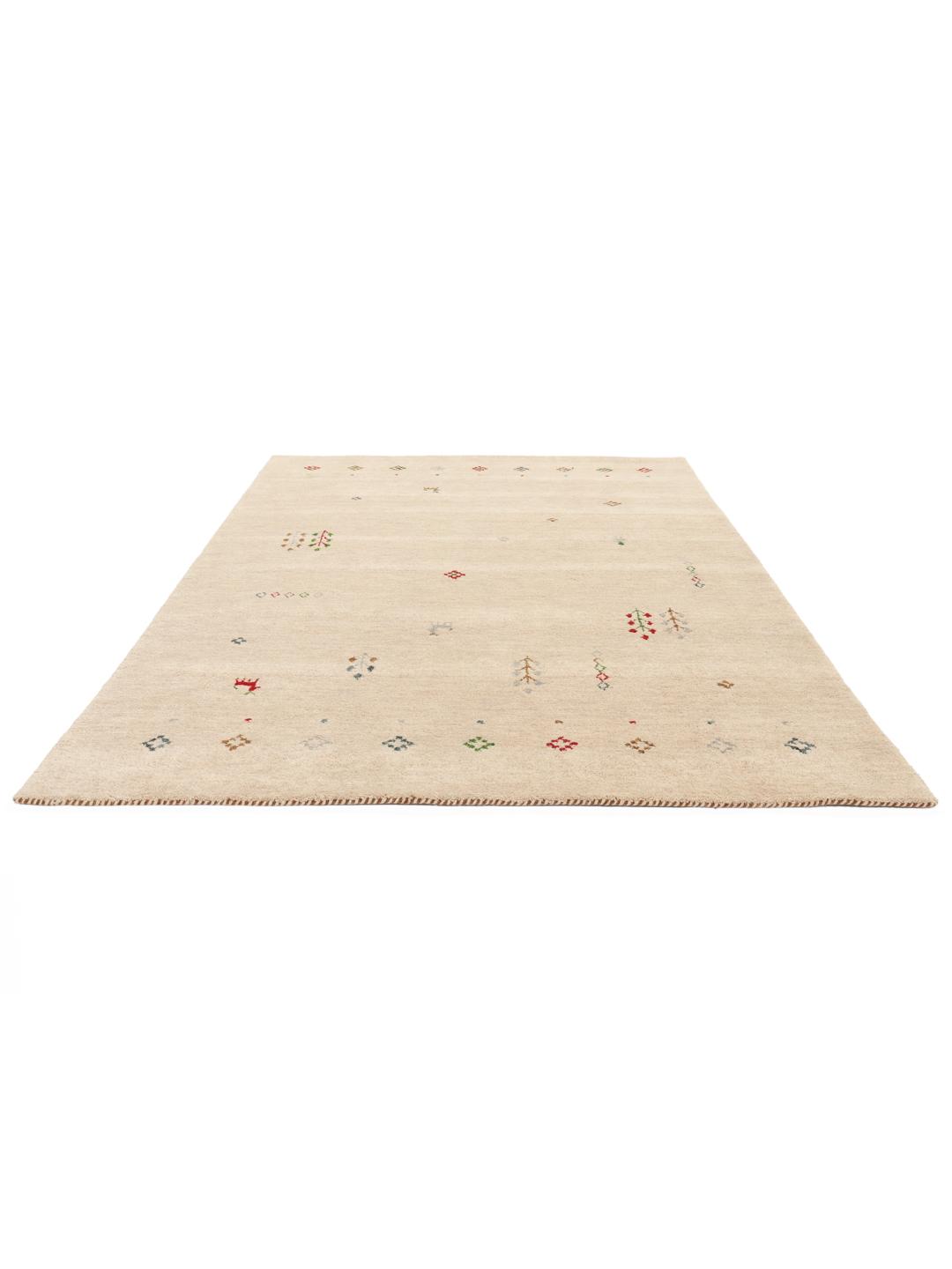beige tæppe med uldluve