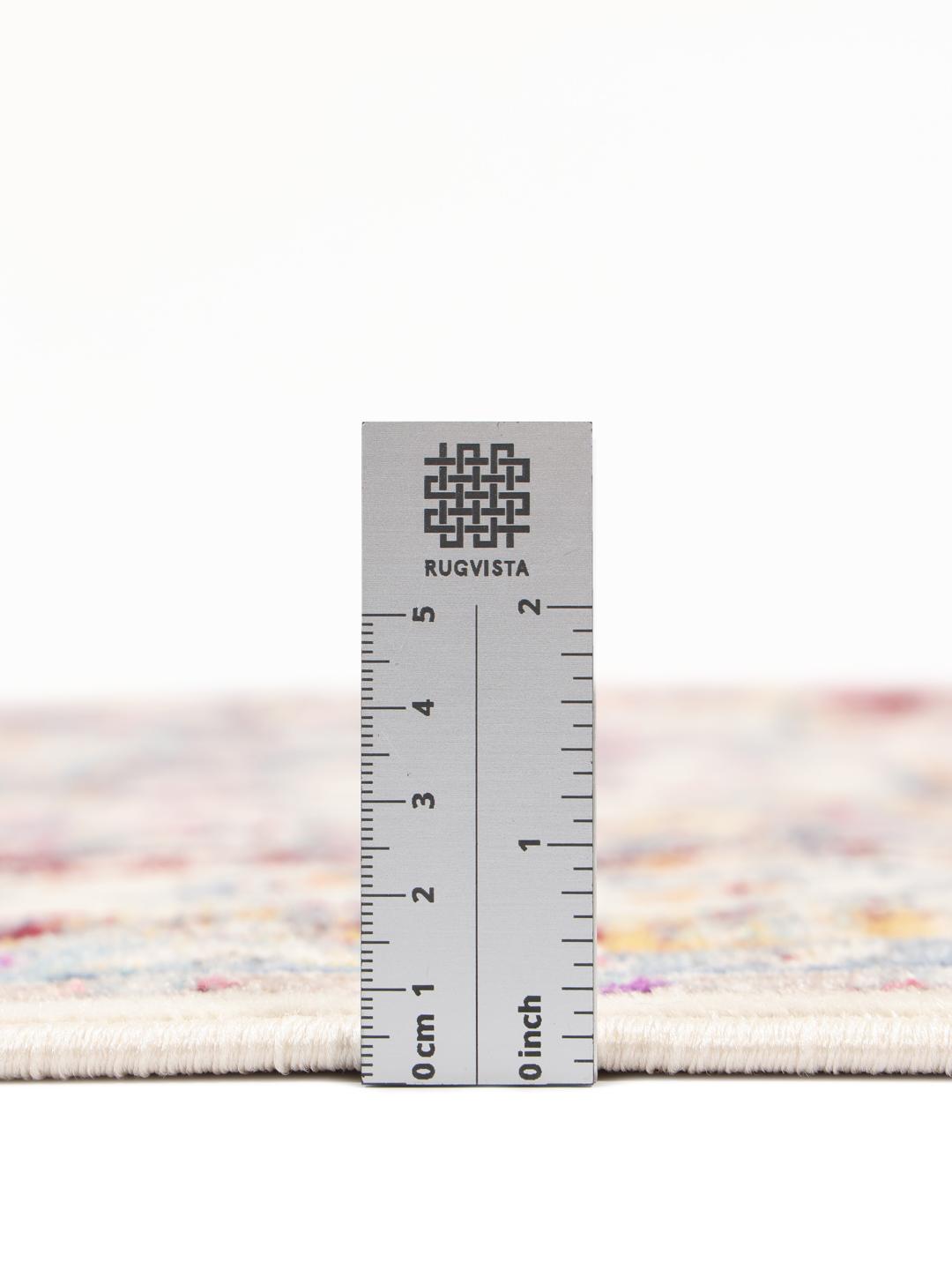 Tapis multicolore avec un motif a medaillon classique