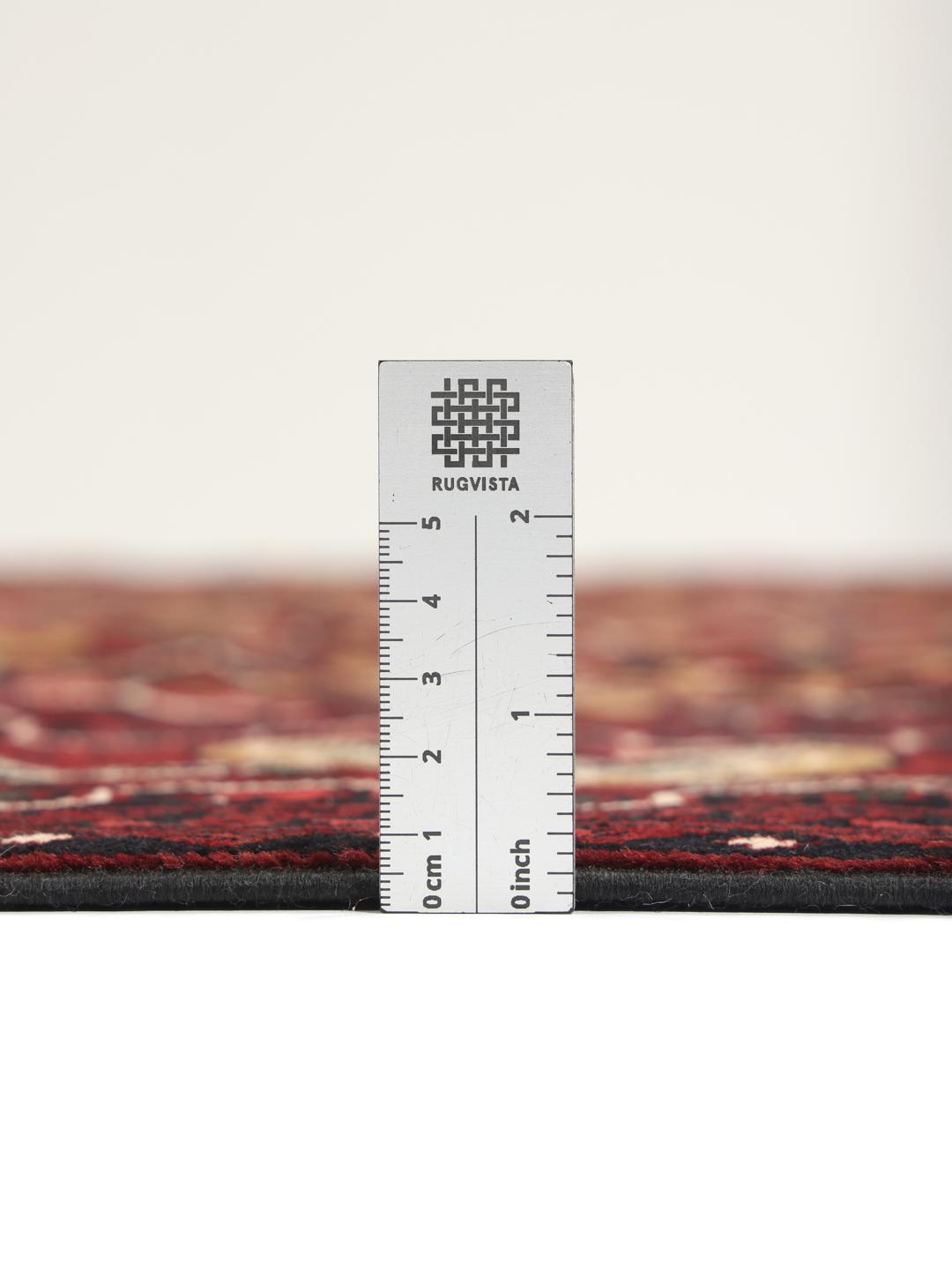 Hand-knotted Afghan Kunduz rug in dark-red with geometric medallions