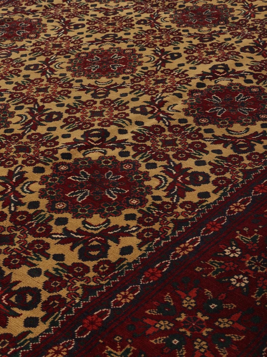Hand-knotted Afghan Kunduz rug in red and yellow