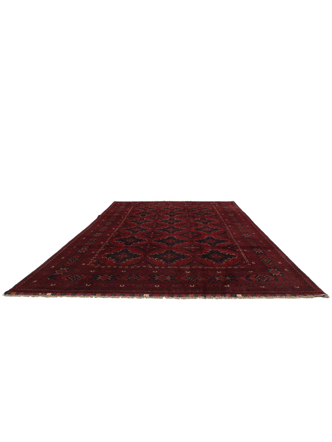 A hand-knotted Kunduz rug from Afghanistan with a dark-red field and geometric patterns.