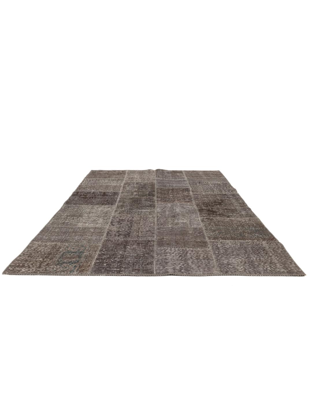 Håndlaget tyrkisk patchwork-teppe i mørkegrå toner