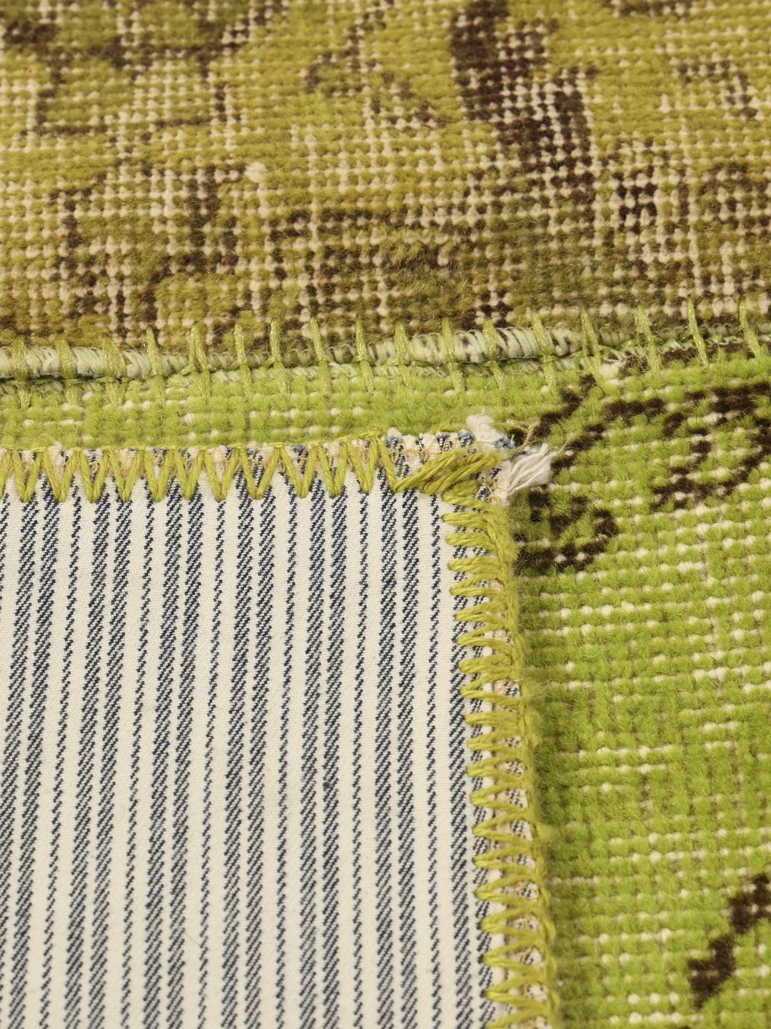 Een uniek handgemaakt groen patchwork tapijt uit het Midden-Oosten