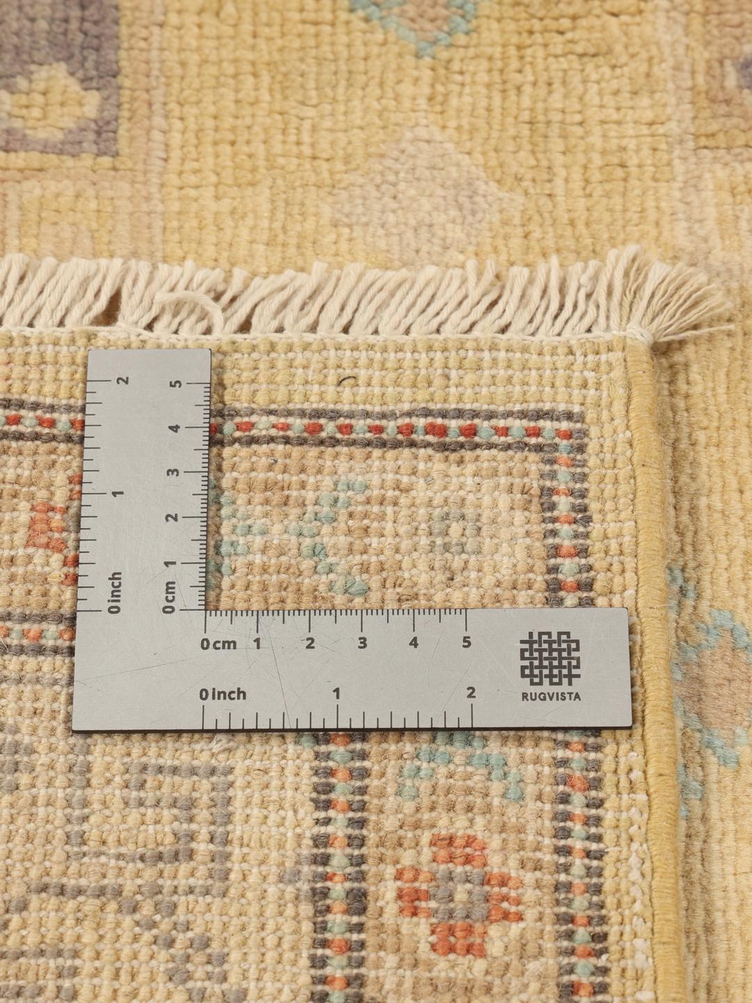 Handgeknoopt Afghaans Kazak-tapijt met beige veld en geometrische motieven