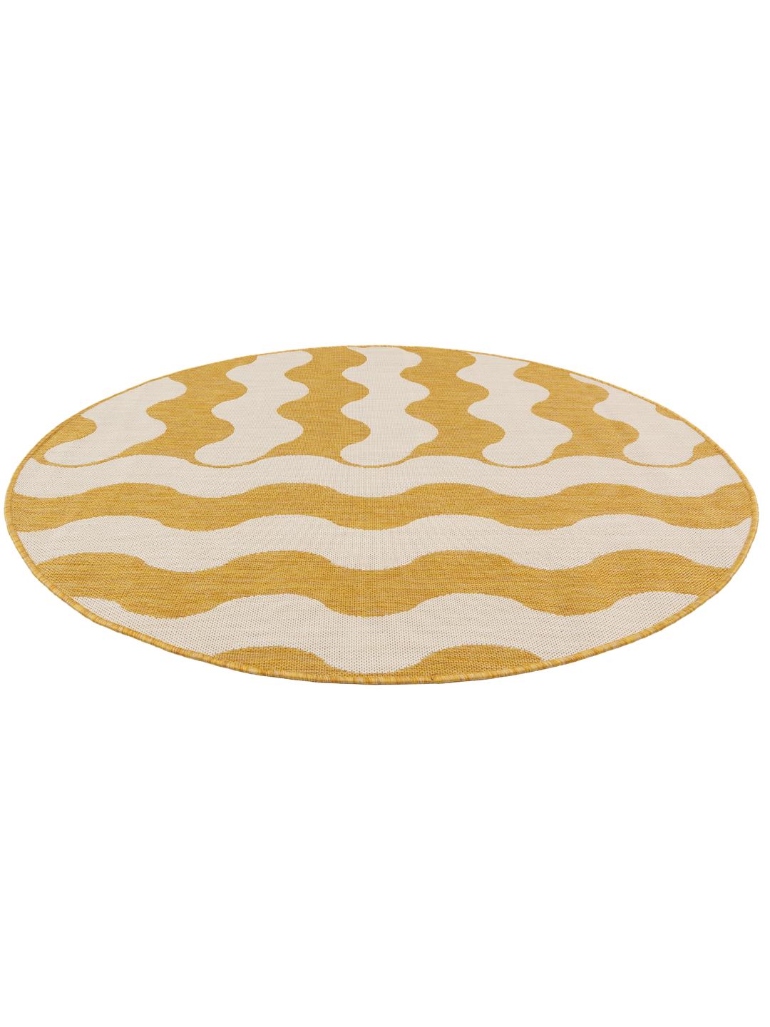 Un tapis rond jaune et blanc avec un motif ondulé