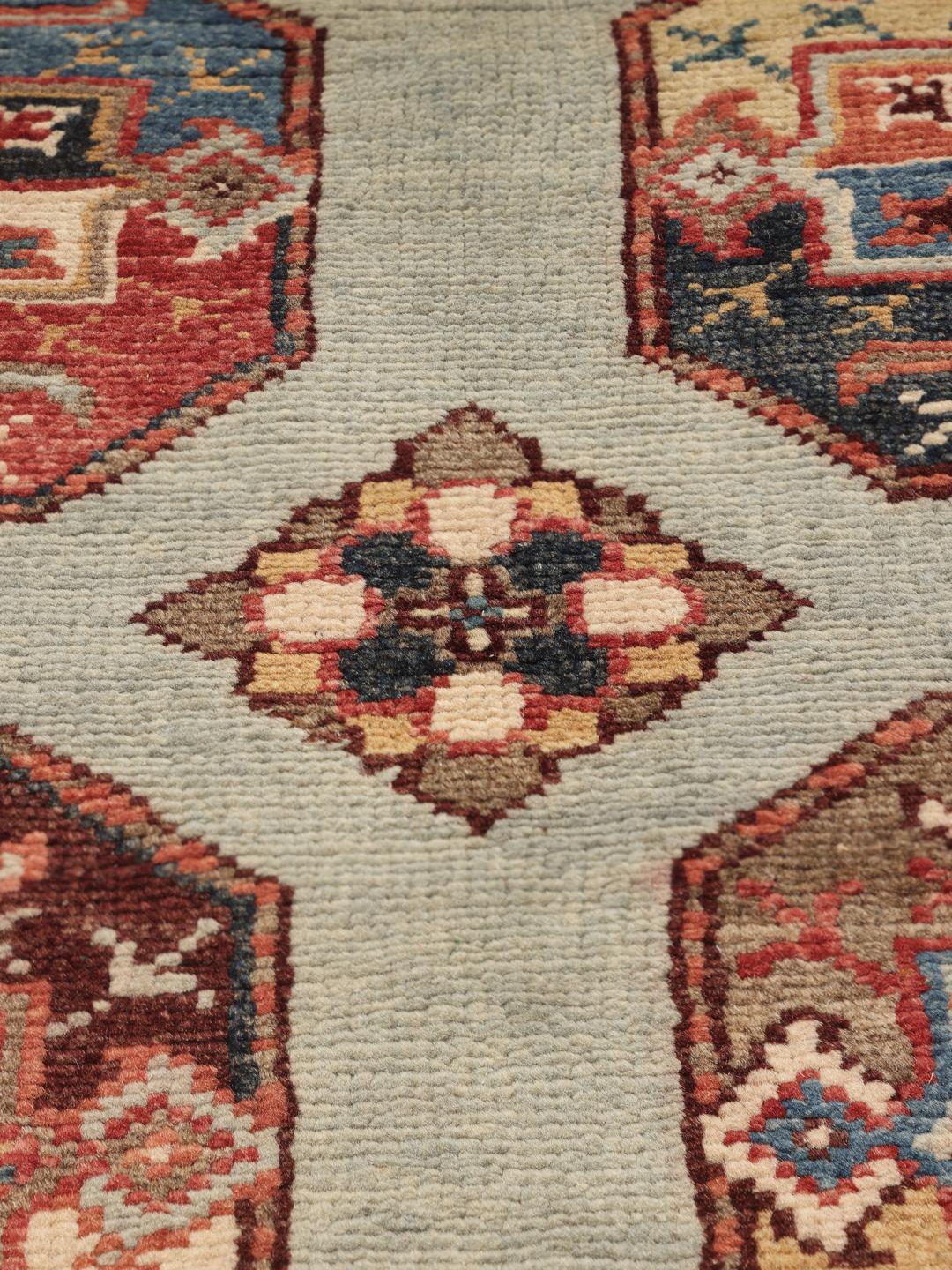 Handgeknüpfter afghanischer Teppich mit geometrischen Motiven aus beiger Wolle