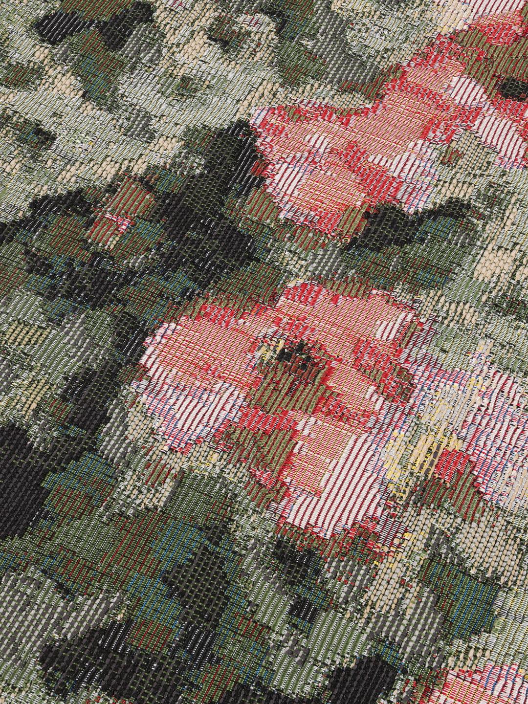 Pink rug with a mottled pattern