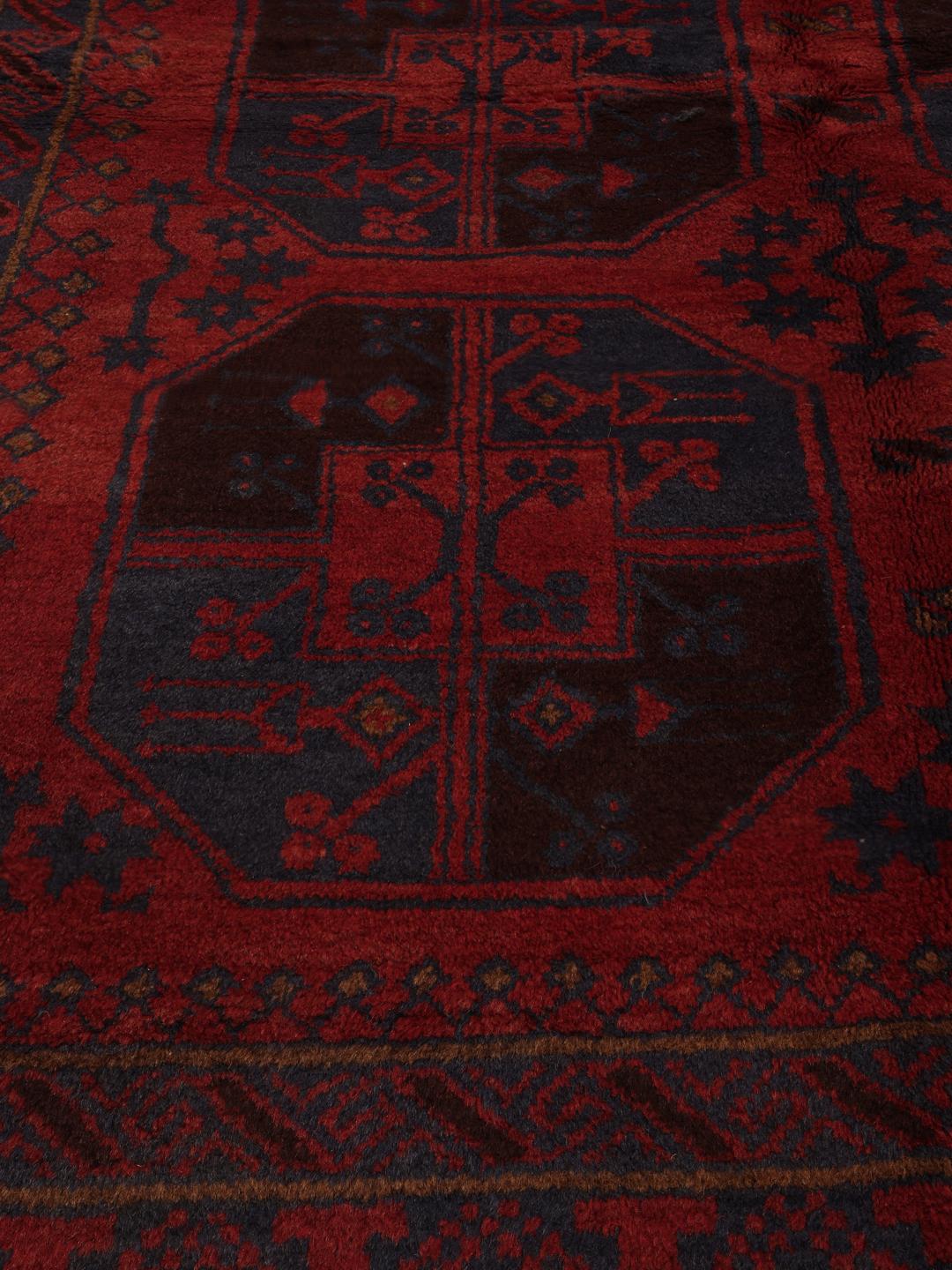 Autentisk afghansk håndknyttet løber med geometriske motiver i rød og blå