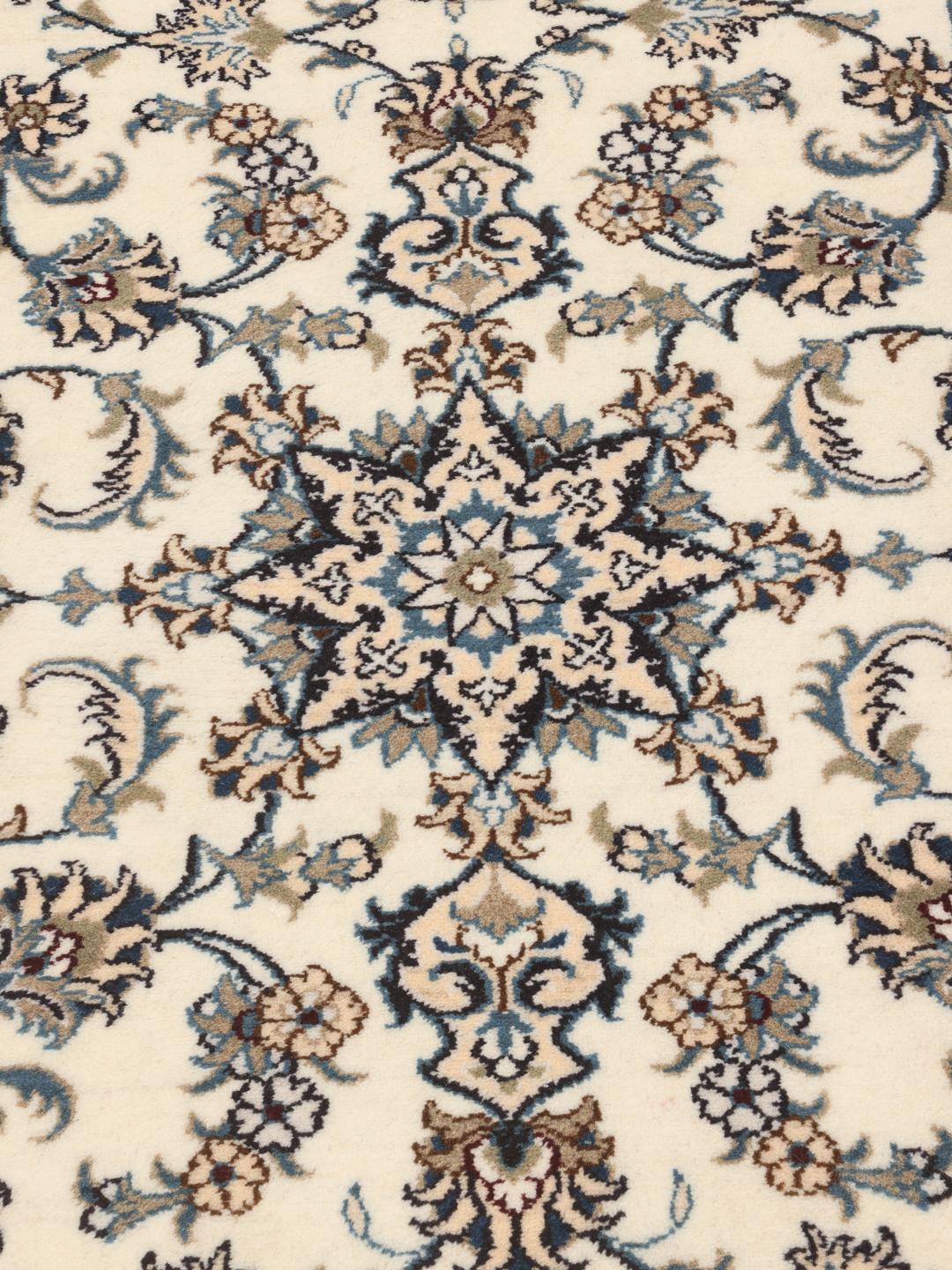 Hand-knotted Nain runner in beige with intricate floral patterns