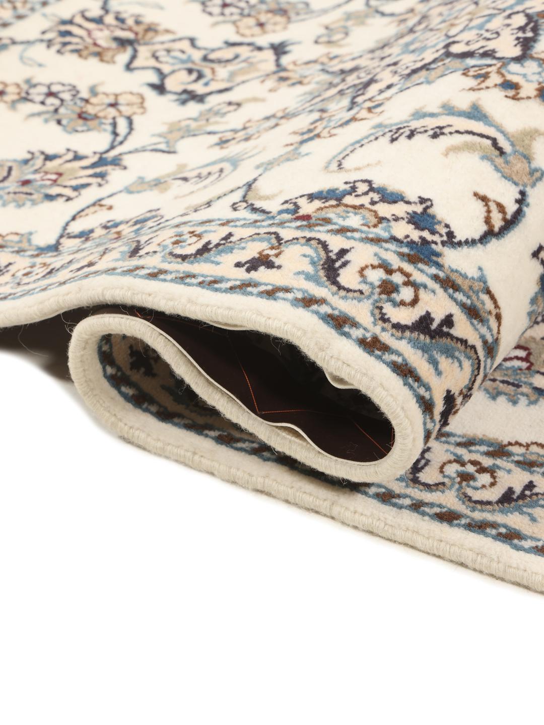 Hand-knotted Nain runner in beige with intricate floral patterns