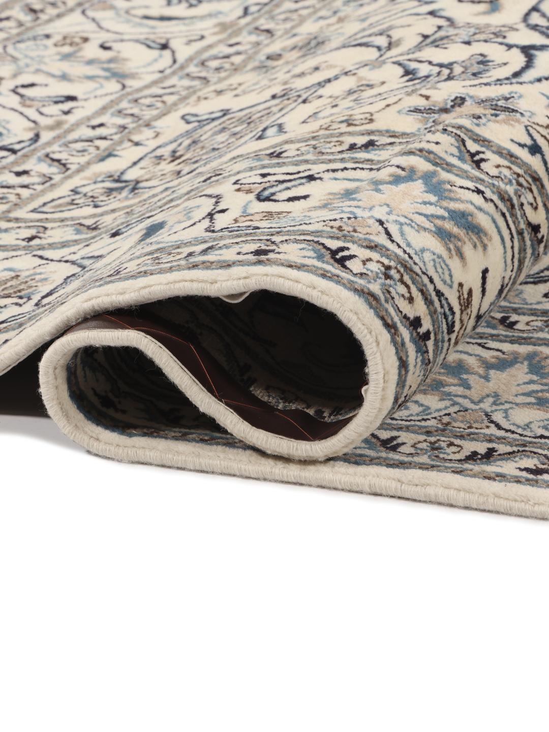 Hand-knotted Nain rug from the Middle East in beige and blue tones