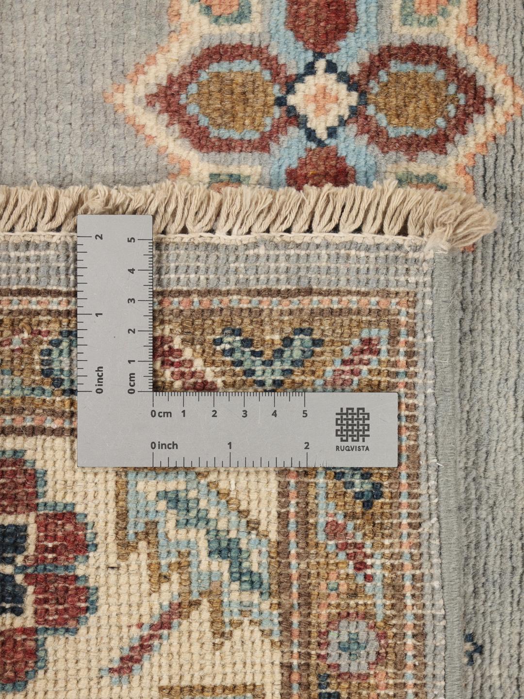 Handgeknoopt Kazak-tapijt uit Afghanistan in blauwtinten met een centraal medaillon