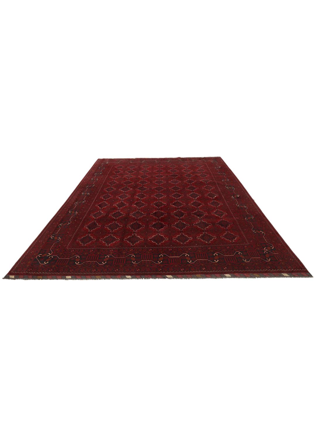 Hand-knotted Kunduz rug from the Middle East in deep red