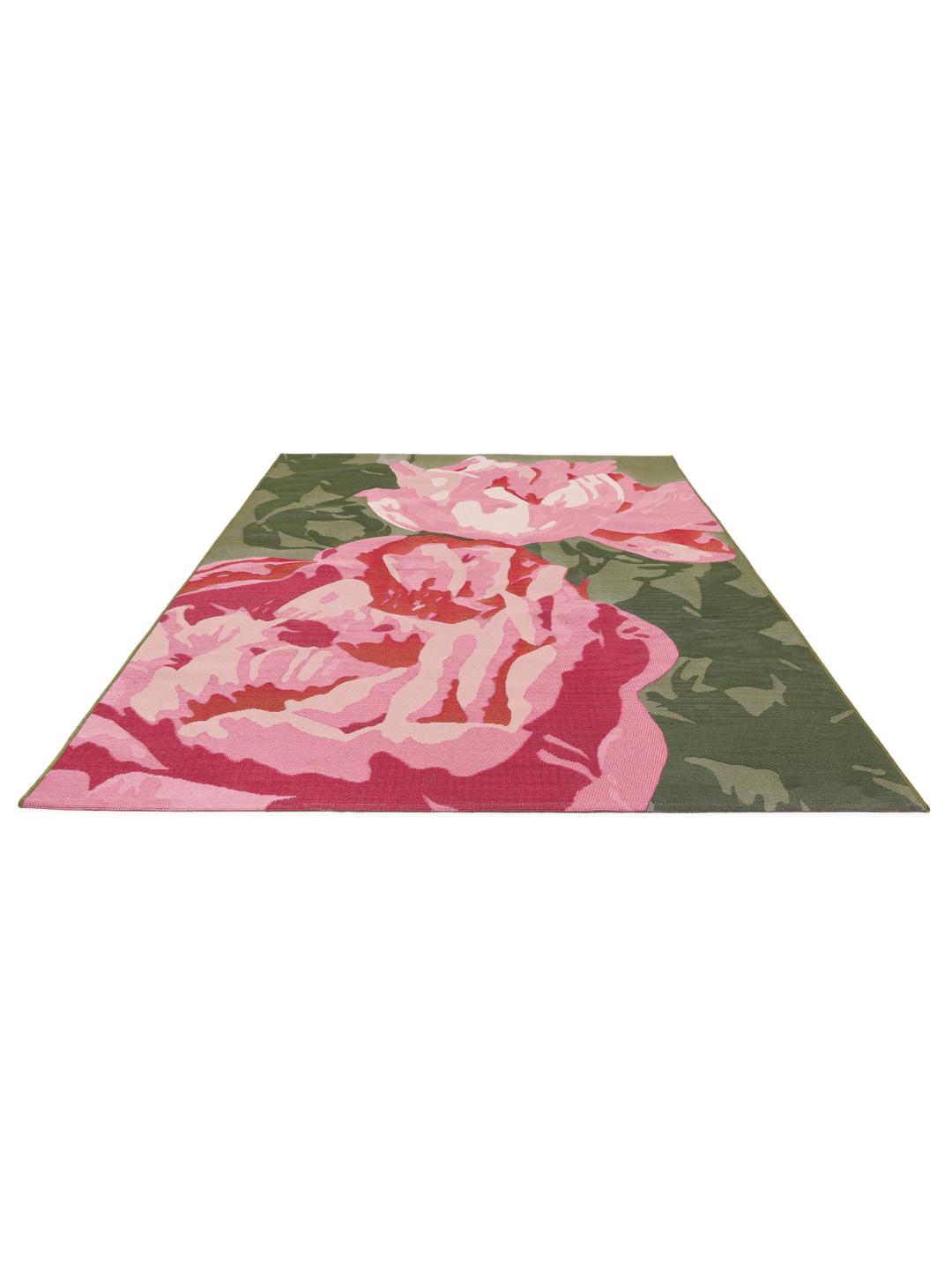 Pink and green rug with large floral pattern